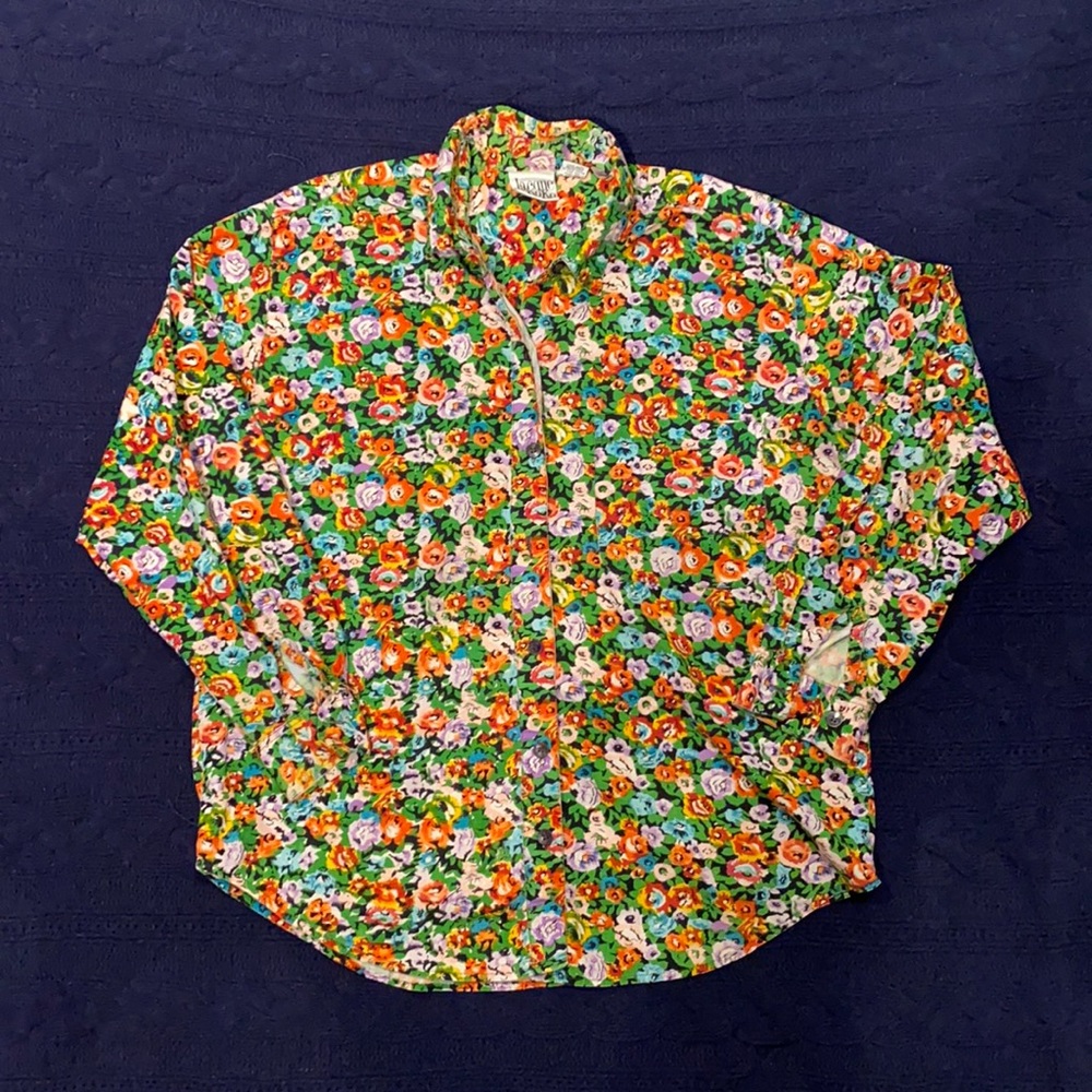 Very colorful lightweight button up with bright floral pattern.